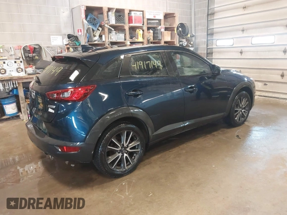 2017 Mazda CX-3 Touring with VIN JM1DKFC72H0145267, listed as a IAAI auction lot 41917149 with 55,784 mi miles. Bid and sale history available at carsss.com. Image 4.