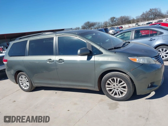 2013 Toyota Sienna XLE AAS with VIN 5TDYK3DCXDS379272, listed as a IAAI auction lot 41407282 with 240,491 mi miles and . Bid and sale history available at carsss.com. Image 13.