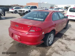 2003 Dodge Stratus SXT with VIN 1B3EL46X13N557744, listed as a IAAI auction lot 41689194 with 206,410 mi miles. Bid and sale history available at carsss.com. Image 4.