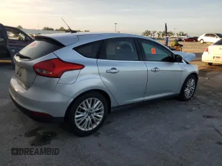 2016 Ford Focus Titanium with VIN 1FADP3N2XGL376941, listed as a Copart auction lot 60560185 with 147,985 mi miles and Salvage title. Bid and sale history available at DreamBid. Image 3.