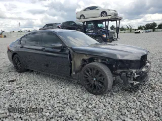 2021 BMW 7 Series 740i with VIN WBA7T2C01MCF78660, listed as a Copart auction lot 59582205 with 51,868 mi miles and Salvage title. Bid and sale history available at DreamBid. Image 4.