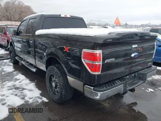 2013 Ford F-150 XL with VIN 1FTFW1EF7DKD00883, listed as a IAAI auction lot 41588646 with 161,497 mi miles. Bid and sale history available at carsss.com. Image 3.
