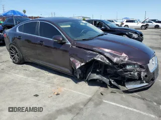 2015 Jaguar XF V6 Portfolio with VIN SAJWA0F79F8U60216, listed as a Copart auction lot 54969245 with 88,954 mi miles and Salvage Title. Bid and sale history available at carsss.com. Image 4.