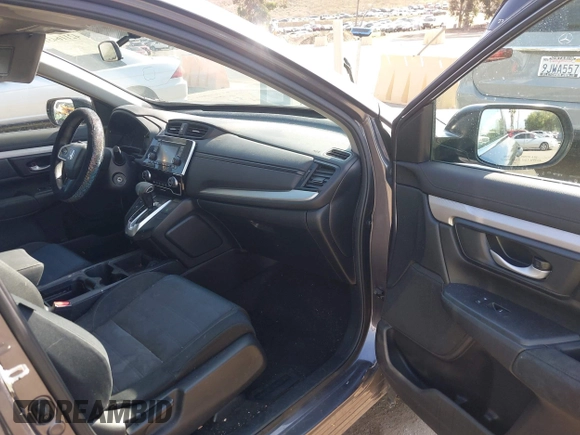 2019 Honda CR-V LX z VIN 2HKRW5H33KH401422, wystawiony jako IAAI lot #42116431 z przebiegiem 119 387 mil mil oraz . Historia ofert i sprzedaży dostępna na DreamBid. Obrazek 5.