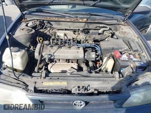 1997 Toyota Corolla with VIN 1NXBA02E5VZ595972, listed as a IAAI auction lot 41622050 with 143,577 mi miles and . Bid and sale history available at DreamBid. Image 10.