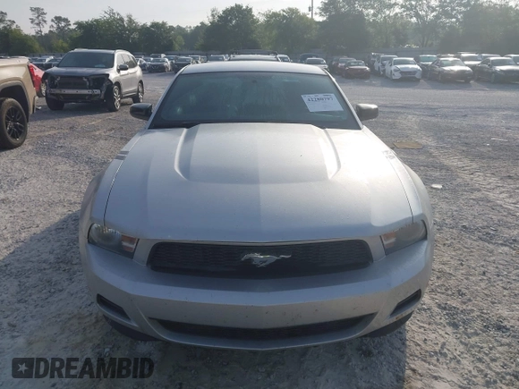 2012 Ford Mustang Premium with VIN 1ZVBP8AM7C5288124, listed as a IAAI auction lot 42280797 with 188,223 mi miles and . Bid and sale history available at DreamBid. Image 12.