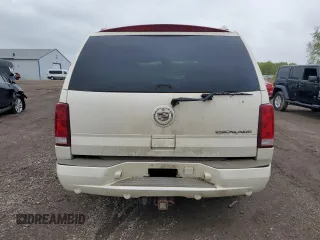 2005 Cadillac Escalade z VIN 1GYEK63N95R204674, wystawiony jako Copart lot #55854175 z przebiegiem 303 771 mil mil oraz Tytuł czysty. Historia ofert i sprzedaży dostępna na DreamBid. Obrazek 6.