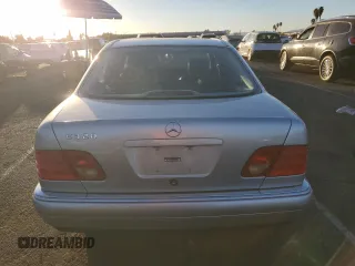 1999 Mercedes-Benz E-Class with VIN WDBJF65H8XA734585, listed as a Copart auction lot 79141194 with 196,908 mi miles and Salvage Title. Bid and sale history available at carsss.com. Image 6.