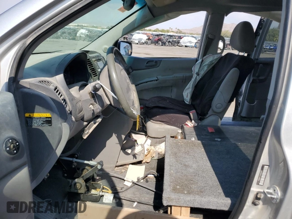 2012 Kia Sedona LX with VIN KNDMG4C71C6492455, listed as a Copart auction lot 63077744 with 210,306 mi miles and Salvage Title. Bid and sale history available at carsss.com. Image 7.