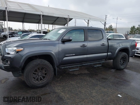 2022 Toyota Tacoma SR5 with VIN 3TMBZ5DN2NM034561, listed as a IAAI auction lot 40867443 with 51,728 mi miles and . Bid and sale history available at DreamBid. Image 14.