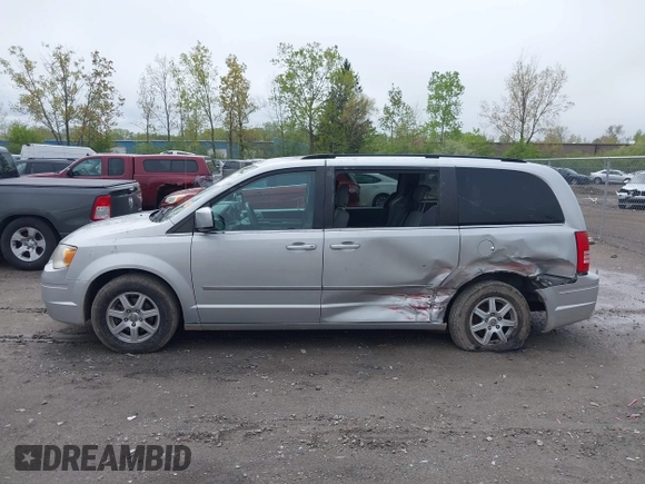 2010 Chrysler Town & Country Touring with VIN 2A4RR5D14AR271397, listed as a IAAI auction lot 42181231 with 200,547 mi miles and . Bid and sale history available at DreamBid. Image 14.