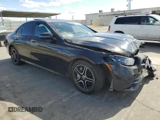 2022 Mercedes-Benz E 350 with VIN W1KZF8DB0NB077775, listed as a Copart auction lot 56567085 with 39,548 mi miles and Salvage title. Bid and sale history available at DreamBid. Image 4.