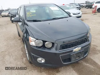 2014 Chevrolet Sonic LT with VIN 1G1JC6SH5E4153094, listed as a IAAI auction lot 41506576 with 118,833 mi miles. Bid and sale history available at carsss.com. Image 1.