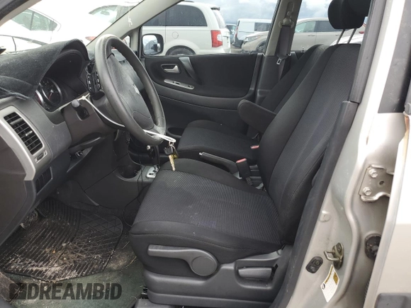 2006 Suzuki Aerio Premium z VIN JS2RC62H265351207, wystawiony jako Copart lot #74980534 z przebiegiem 64 199 mil mil oraz Nie do naprawy • Non repairable. Historia ofert i sprzedaży dostępna na DreamBid. Obrazek 7.
