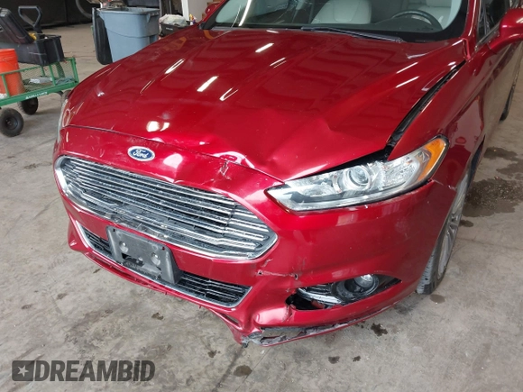 2016 Ford Fusion Titanium z VIN 3FA6P0K95GR119017, wystawiony jako IAAI lot #42148460 z przebiegiem 84 770 mil mil oraz . Historia ofert i sprzedaży dostępna na DreamBid. Obrazek 6.