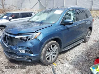 2017 Honda Pilot Touring with VIN 5FNYF6H93HB017623, listed as a IAAI auction lot 41996650 with 97,946 mi miles. Bid and sale history available at carsss.com. Image 17.