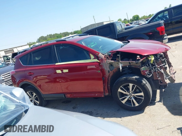 2018 Toyota RAV4 XLE with VIN 2T3WFREV8JW425464, listed as a IAAI auction lot 41977877 with 142,265 mi miles and . Bid and sale history available at carsss.com. Image 13.