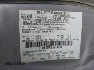 2006 Ford Taurus SE with VIN 1FAFP53U06A253233, listed as a IAAI auction lot 41695528 with 1 mi miles. Bid and sale history available at carsss.com. Image 9.