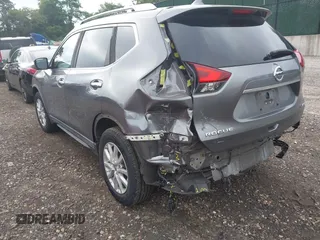 2017 Nissan Rogue S with VIN KNMAT2MV2HP581419, listed as a IAAI auction lot 42671858 with 121,308 mi miles and . Bid and sale history available at DreamBid. Image 6.