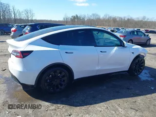 2021 Tesla Model Y Long Range with VIN 5YJYGAEE6MF196610, listed as a IAAI auction lot 41516909 with 30,431 mi miles. Bid and sale history available at carsss.com. Image 14.