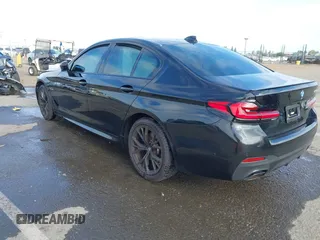 2023 BMW 5 Series 530e with VIN WBA13AG09PCL56556, listed as a IAAI auction lot 42098427 with Not provided miles and . Bid and sale history available at DreamBid. Image 3.