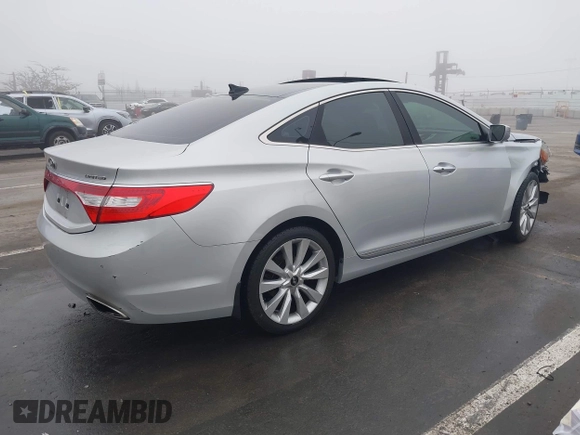 2014 Hyundai Azera Limited with VIN KMHFH4JG7EA388931, listed as a IAAI auction lot 41468407 with 130,597 mi miles and . Bid and sale history available at DreamBid. Image 4.