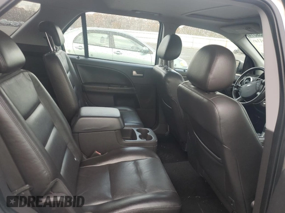 2006 Ford Freestyle Limited z VIN 1FMZK06116GA30878, wystawiony jako Copart lot #82559514 z przebiegiem 200 426 mil mil oraz Szkody całkowita. Historia ofert i sprzedaży dostępna na DreamBid. Obrazek 11.