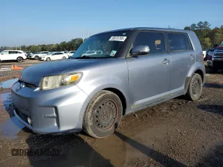2011 Scion xB with VIN JTLZE4FE2B1121651, listed as a Copart auction lot 50070765 with 158,979 mi miles and Salvage Title. Bid and sale history available at carsss.com. Image 1.