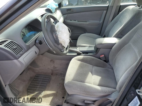 2002 Toyota Camry XLE z VIN 4T1BF32K02U034535, wystawiony jako Copart lot #53894995 z przebiegiem 253 037 mil mil oraz Szkoda całkowita • Salvage title. Historia ofert i sprzedaży dostępna na DreamBid. Obrazek 7.