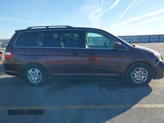 2007 Honda Odyssey EX-L with VIN 5FNRL38697B460066, listed as a IAAI auction lot 41453305 with 169,008 mi miles. Bid and sale history available at carsss.com. Image 13.