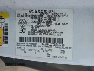 2013 Ford Fusion SE Hybrid z VIN 3FA6P0LU7DR245720, wystawiony jako Copart lot #60231425 z przebiegiem 249 180 mil mil oraz Czysty tytuł • Clean title. Historia ofert i sprzedaży dostępna na DreamBid. Obrazek 12.
