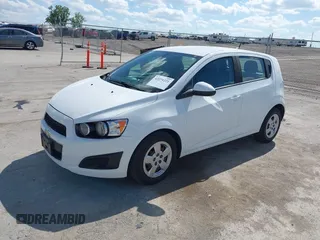 2014 Chevrolet Sonic LS with VIN 1G1JA6SH5E4171729, listed as a IAAI auction lot 42271221 with 58,117 mi miles and . Bid and sale history available at DreamBid. Image 2.