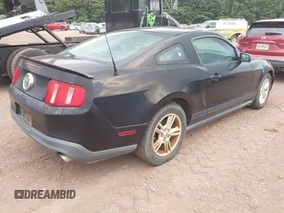 2012 Ford Mustang Premium with VIN 1ZVBP8AM6C5233888, listed as a IAAI auction lot 42714667 with 153,219 mi miles and . Bid and sale history available at DreamBid. Image 4.