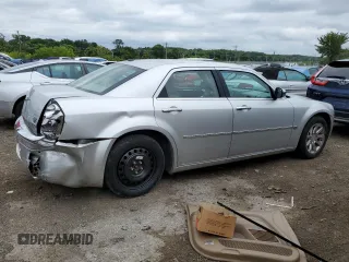 2006 Chrysler 300 C with VIN 2C3LA63H06H527558, listed as a Copart auction lot 64665314 with 74,237 mi miles and Salvage Title. Bid and sale history available at carsss.com. Image 3.