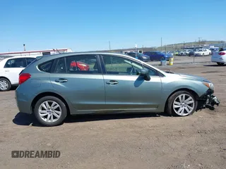 2015 Subaru Impreza Premium z VIN JF1GPAC64FH212027, wystawiony jako IAAI lot #41995629 z przebiegiem 161 006 mil mil oraz . Historia ofert i sprzedaży dostępna na DreamBid. Obrazek 13.