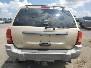 1999 Jeep Grand Cherokee Laredo with VIN 1J4GW58N7XC799434, listed as a Copart auction lot 64790905 with 272,384 mi miles and Salvage title. Bid and sale history available at DreamBid. Image 6.