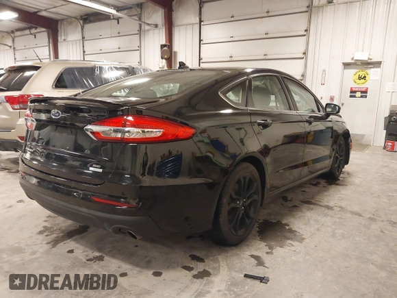 2019 Ford Fusion SE with VIN 3FA6P0HD5KR284103, listed as a IAAI auction lot 41477133 with 90,722 mi miles and . Bid and sale history available at carsss.com. Image 4.