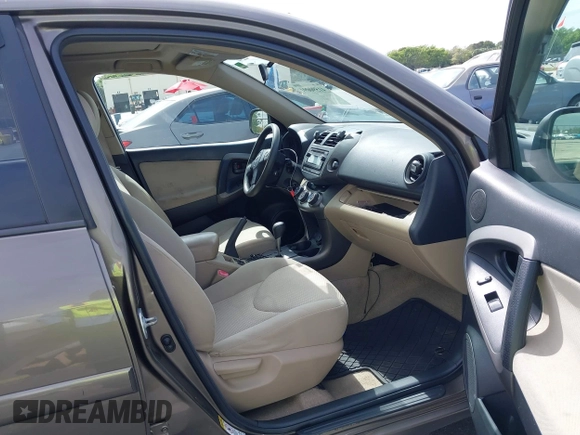 2012 Toyota RAV4 with VIN 2T3BF4DV4CW237305, listed as a IAAI auction lot 41590091 with 114,757 mi miles and . Bid and sale history available at carsss.com. Image 5.