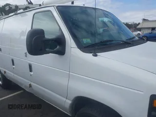 2012 Ford Econoline Cargo Commercial with VIN 1FTNE1EWXCDB38975, listed as a IAAI auction lot 41747167 with 331,484 mi miles and . Bid and sale history available at carsss.com. Image 13.