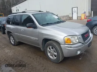 2004 GMC Envoy SLE with VIN 1GKDS13S442350938, listed as a IAAI auction lot 41790810 with 161,998 mi miles. Bid and sale history available at carsss.com. Image 1.