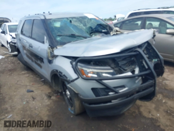2018 Ford Police Interceptor Utility z VIN 1FM5K8ARXJGB59236, wystawiony jako IAAI lot #42076697 z przebiegiem Nie podano mil oraz . Historia ofert i sprzedaży dostępna na DreamBid. Obrazek 1.