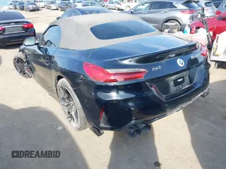 2022 BMW Z4 sDriveM40i with VIN WBAHF9C08NWX38258, listed as a IAAI auction lot 41462157 with 43,534 mi miles. Bid and sale history available at carsss.com. Image 3.