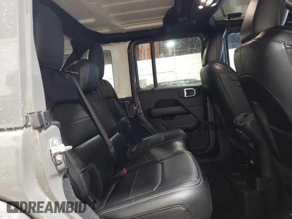 2022 Jeep Wrangler Unlimited Sahara Altitude with VIN 1C4HJXEG4NW248402, listed as a Copart auction lot 63052465 with 36,732 mi miles and Salvage title. Bid and sale history available at DreamBid. Image 11.