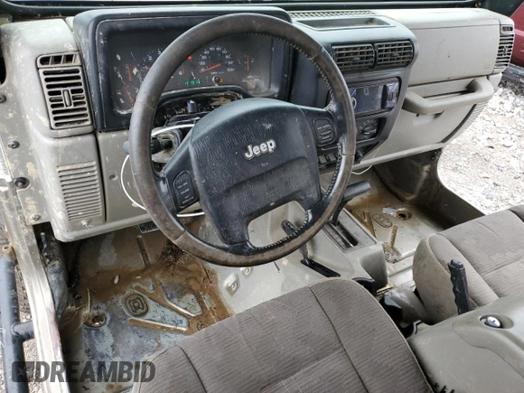 2004 Jeep Wrangler Rubicon with VIN 1J4FA69S94P774219, listed as a Copart auction lot 62806594 with 121,819 mi miles and Salvage Title. Bid and sale history available at carsss.com. Image 8.
