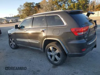 2011 Jeep Grand Cherokee Overland with VIN 1J4RS6GG0BC557302, listed as a Copart auction lot 83851734 with 195,443 mi miles and Salvage Title. Bid and sale history available at DreamBid. Image 2.