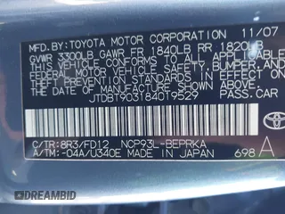 2008 Toyota Yaris with VIN JTDBT903184019529, listed as a IAAI auction lot 41801008 with 186,628 mi miles. Bid and sale history available at carsss.com. Image 9.