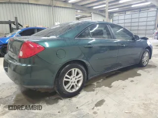 2006 Pontiac G6 6-Cyl with VIN 1G2ZG558764182512, listed as a Copart auction lot 71383534 with 241,397 mi miles and Salvage Title. Bid and sale history available at carsss.com. Image 3.