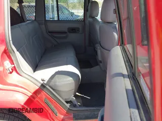 1997 Jeep Cherokee Country with VIN 1J4FJ78SXVL568925, listed as a IAAI auction lot 42254459 with Not provided miles and . Bid and sale history available at DreamBid. Image 8.