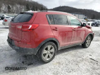 2012 Kia Sportage LX z VIN KNDPBCA25C7307217, wystawiony jako Copart lot #87857155 z przebiegiem 122 235 mil mil oraz Szkoda całkowita • Salvage title. Historia ofert i sprzedaży dostępna na DreamBid. Obrazek 3.