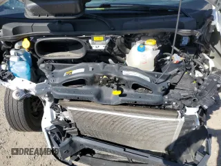 2023 Ram ProMaster Cargo with VIN 3C6LRVAG7PE583784, listed as a Copart auction lot 73926394 with 33,434 mi miles and Salvage Title. Bid and sale history available at DreamBid. Image 12.